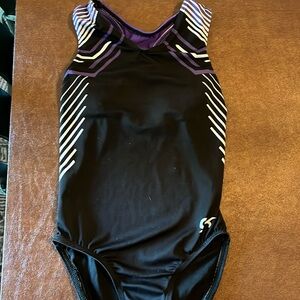 Black with purple and white gymnastics leotard